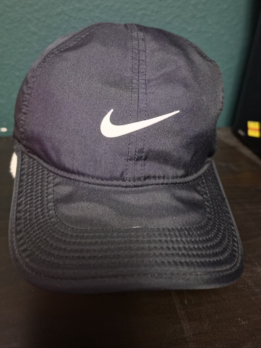 Nike Black Cap with White Swoosh Logo
